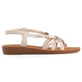 Beige damsandaler med gulddekor