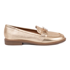 Snygga dammockasiner i guld gyllene