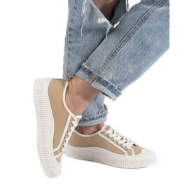 Mörkbeige damsneakers på plattformen