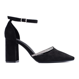 Högklackade pumps i svart mocka