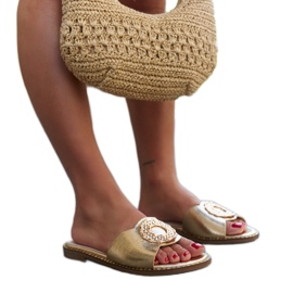 Guldflipflops med läderinlägg från Buenas gyllene