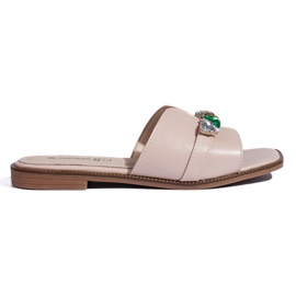 Beige damflipflops med stenar
