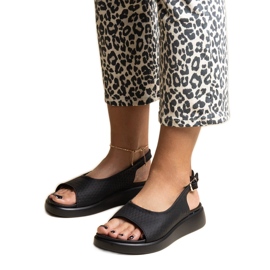 Svarta sandaler med tjock Hamond-sula