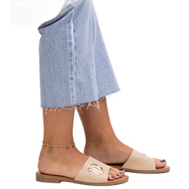 Beige spänne slides från Almeita