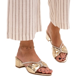 Högklackade mulor dekorerade med Anbrani zirkoner gyllene