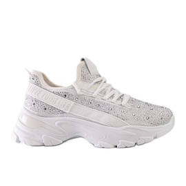 Vita glänsande sneakers med massiv Senai-sula