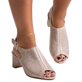 Genombrutna högklackade sandaler med innersula i läder från Mawiya beige