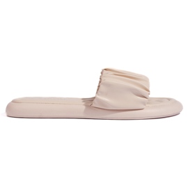 Rugiga beige flipflops för kvinnor