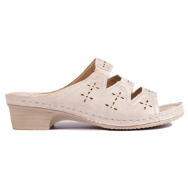 Genombrutna beige kilmulor