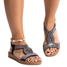 Svarta sandaler dekorerade med Michalina zirkoner