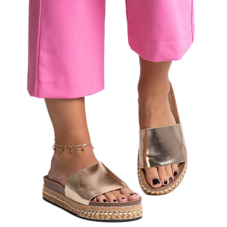 Guldflipflops med en dekorativ Jasminesula gyllene