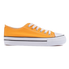 Gula klassiska damsneakers med snörning