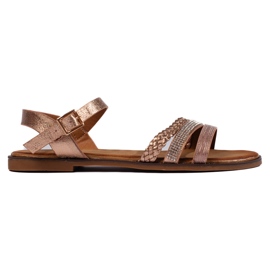 Platta sandaler i guld för kvinnor gyllene