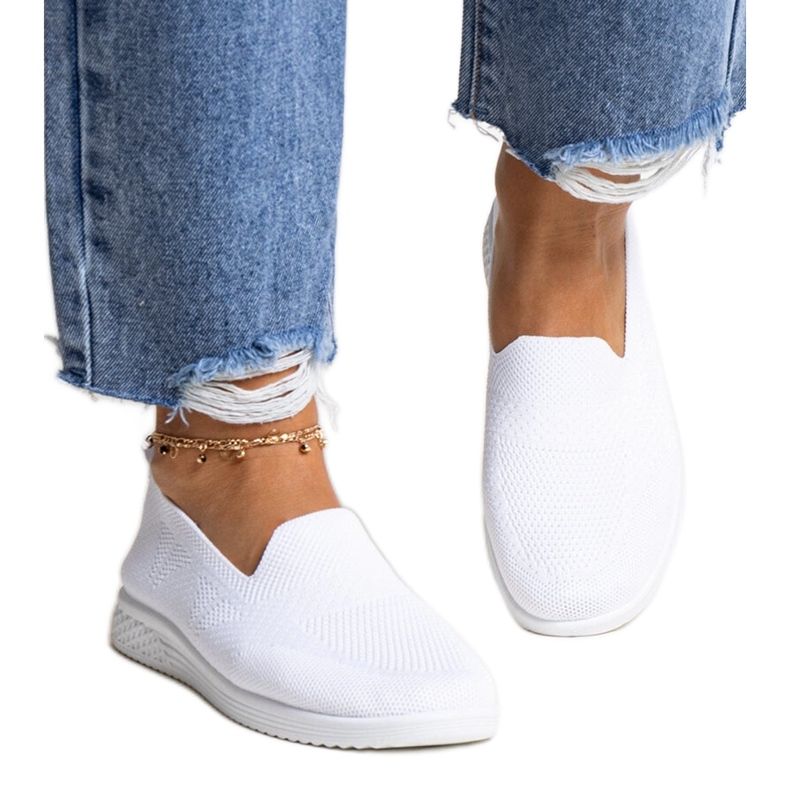 Dåligt vita slip-on sneakers