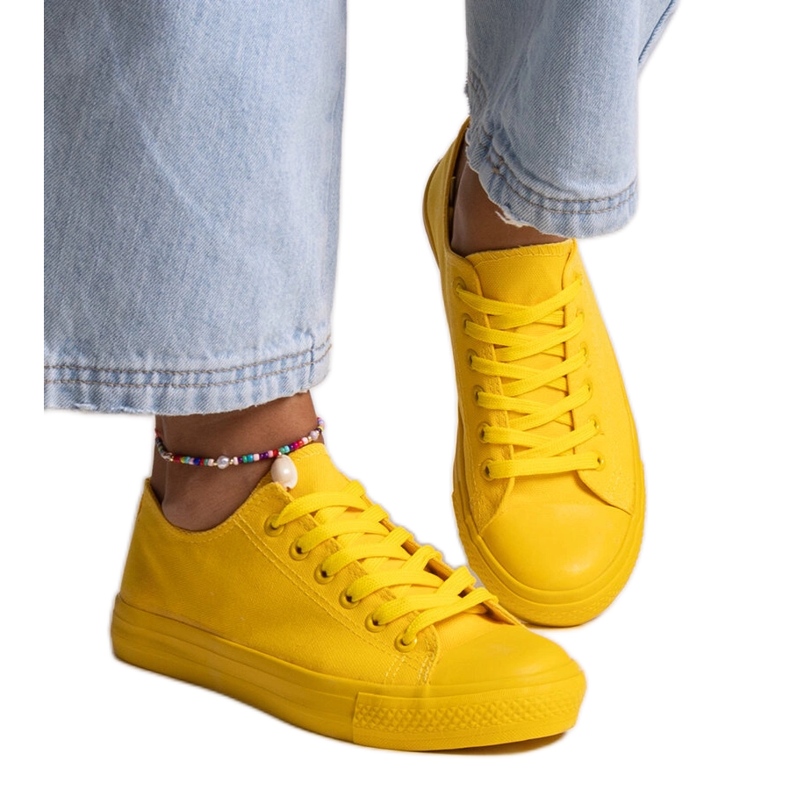 Gula klassiska Nudar sneakers