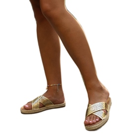 Genombrutna tofflor i guld Awet gyllene