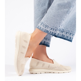 Slip-on i beige textil för kvinnor