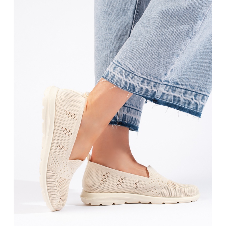 Slip-on i beige textil för kvinnor