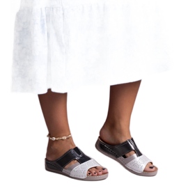 Vita och svarta blanka Saminar flip-flops