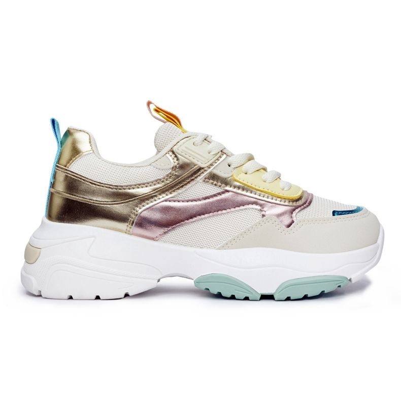 Damsportskor med tjock sula gyllene