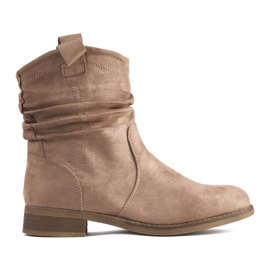 Skrynkliga stövlar i beige mocka