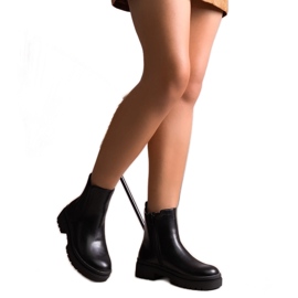 Svarta isolerade klassiska slip-on ankelboots från Edina