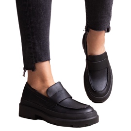 Svarta skor gjorda av Seraphin eco-läder