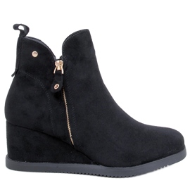 Paxten svarta stövlar med kil i mocka