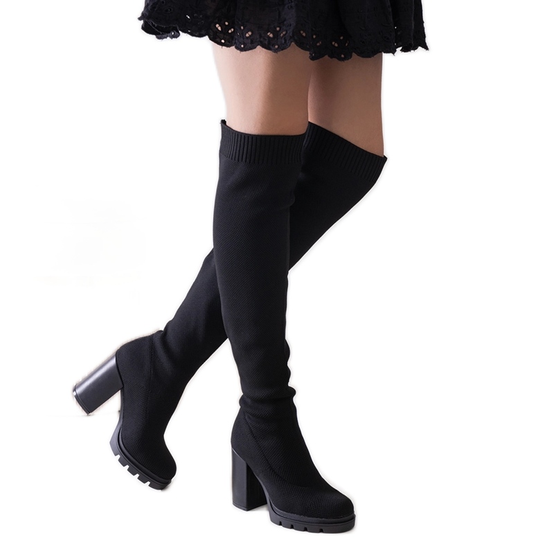 Lija långa svarta högklackade slip-on boots