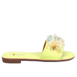 Gröna tofflor med färgade stenar