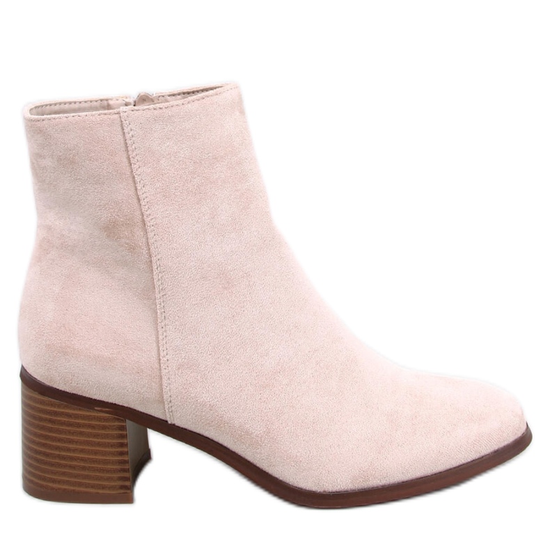 Klassiska beige högklackade ankelboots