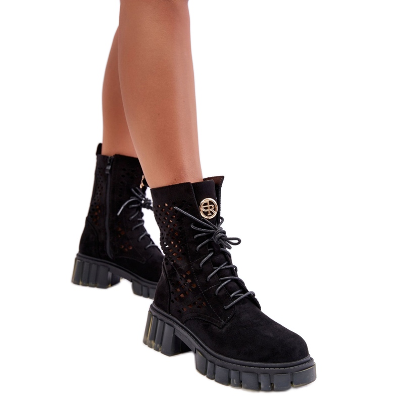 Svarta genombrutna stövlar för kvinnor