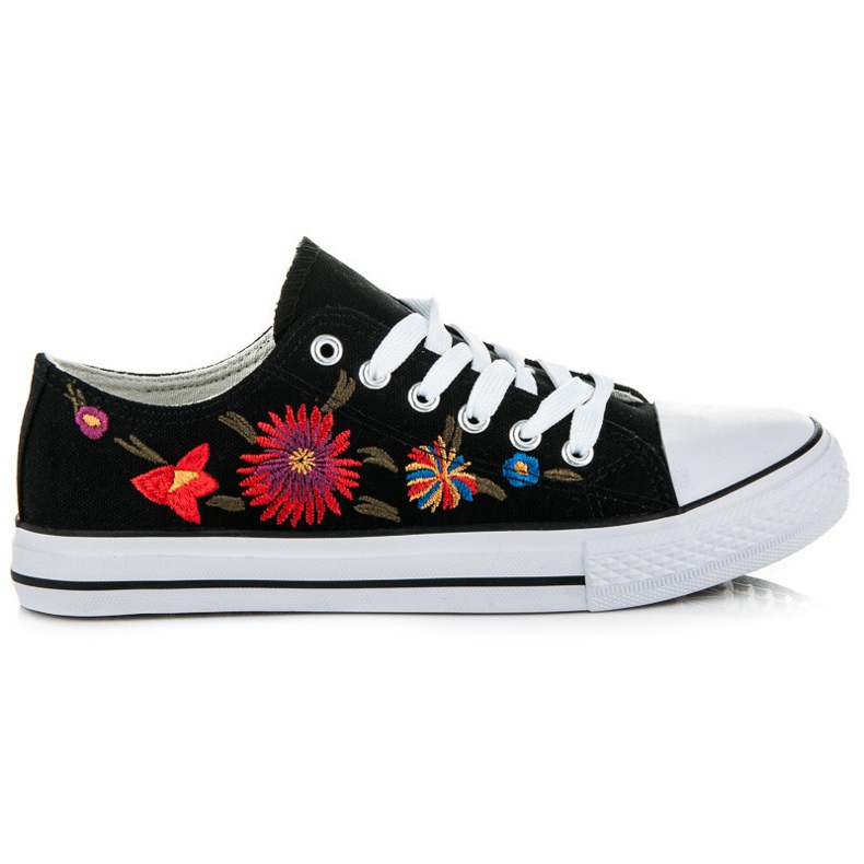 Sneakers med snörning och lappar svart