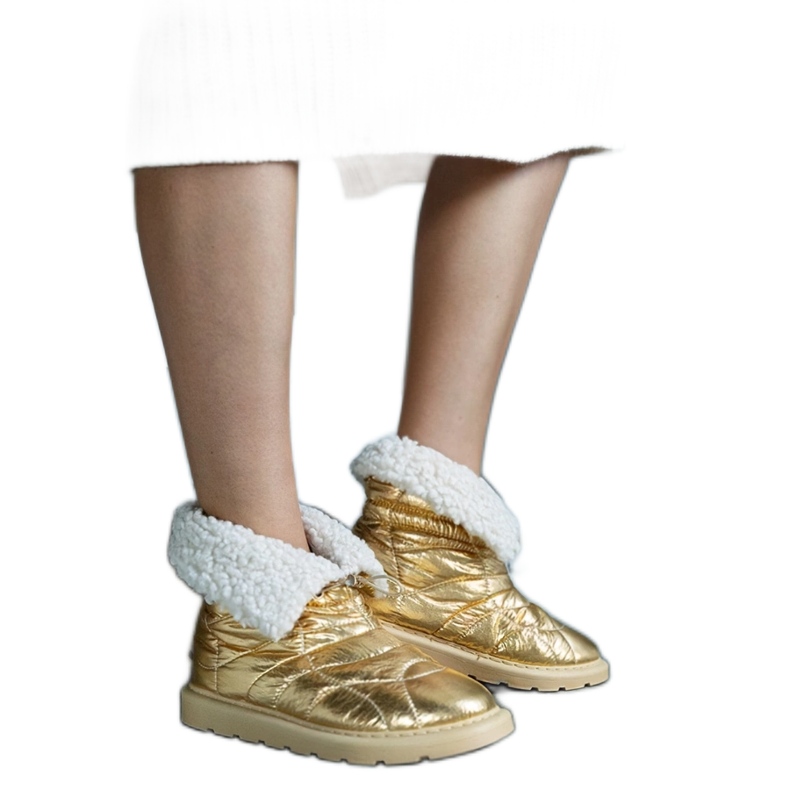Caellita guldisolerade snöstövlar med manschett gyllene