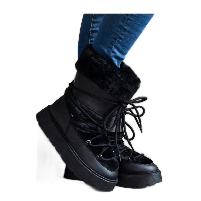 Svarta isolerade snöstövlar med snörning dekorerade med päls