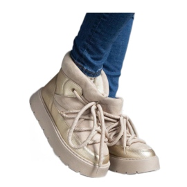 Beige plattformssnöskor isolerade med Sapphi - Solea-päls