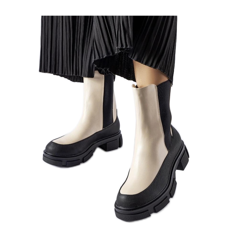 Beige och svarta slip-on ankelboots från Faisal - Solea