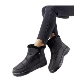 Svarta isolerade snöstövlar med dragkedja