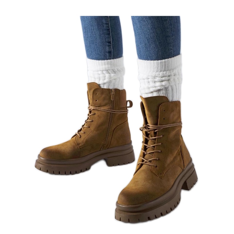 Bruna stövlar med sliten tå från Vadnais - Solea