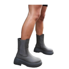 Gröna isolerade plattformsstövlar