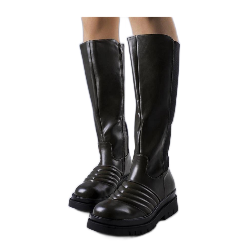 Gröna stövlar med quiltning