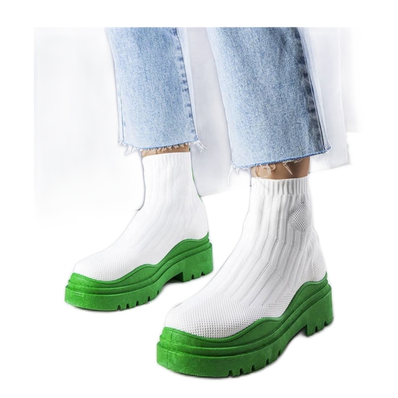 Vita sockboots med grön sula