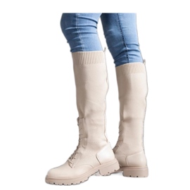 Beiga slip-on boots med en flexibel tyg ovandel beige