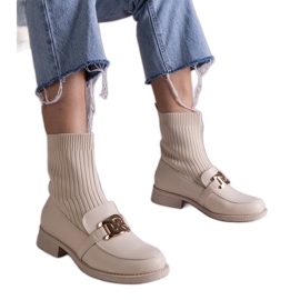 Beige stövlar med ovandel i tyg