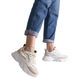 Damsneakers i beige och guld
