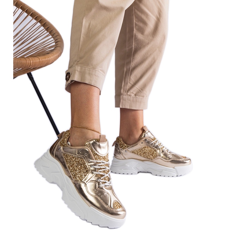 Damsneakers i guld med glitterinlägg gyllene