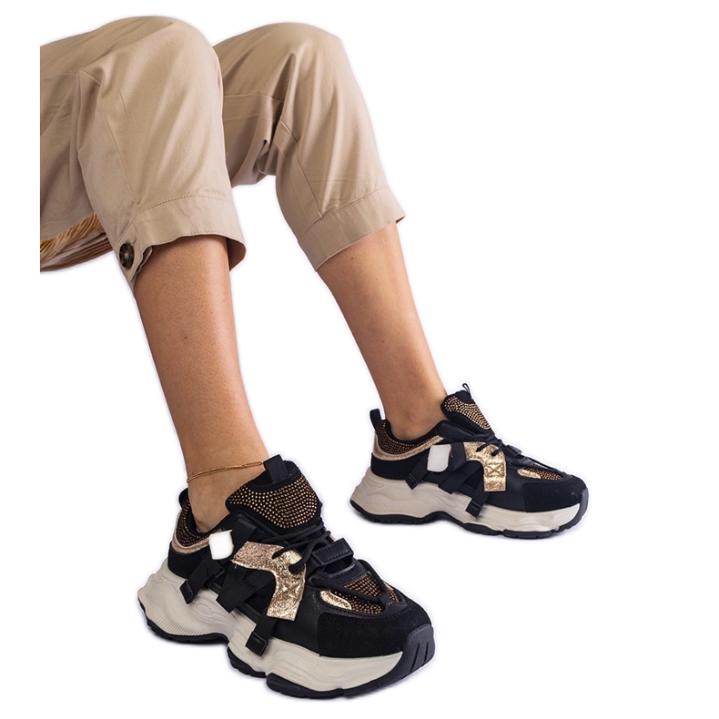 Svarta sneakers med guldinlägg