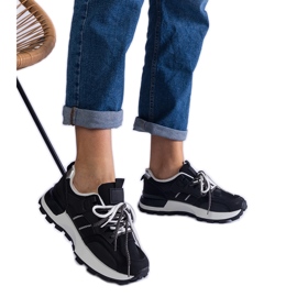 Svart sportkvinnors sneakers