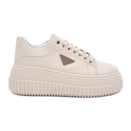 Snygga sneakers på en massiv lätt beige -plattform
