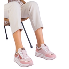 Rosa sportsneakers på plattformen dekorerad med glitter